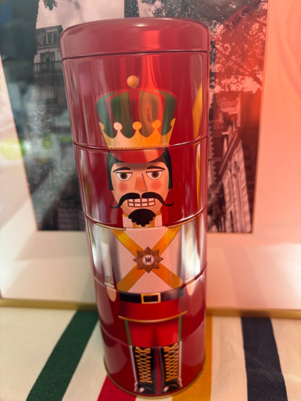 9 1/2 " tall Hudson Bay Company "Red Nutcracker Decorative Tin Tower"/Coin Bank